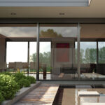 Baie vitrée coulissante dans une maison moderne qui donne sur un extérieur avec une fontaine