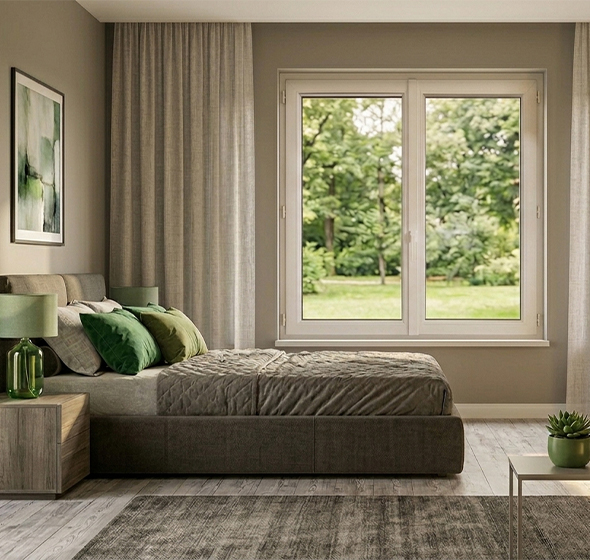 Chambre à coucher au décor minimaliste dans des tons verts et taupe, avec une fenêtre Évoline Élégance blanche.
